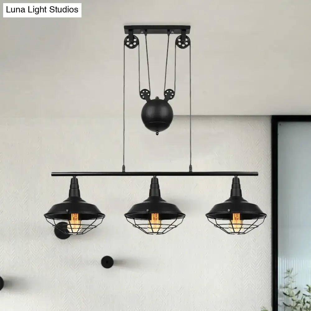 Industrial black metal farmhouse barn island pendant with three dome cage shades and adjustable chain cord length pulley system