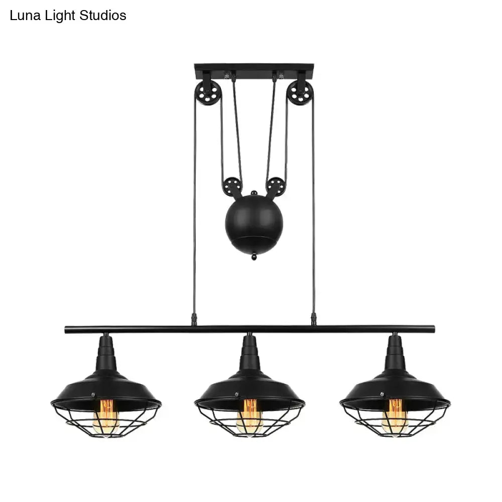 Black industrial farmhouse barn island pendant with three cage shades and adjustable chain cord length pulley system
