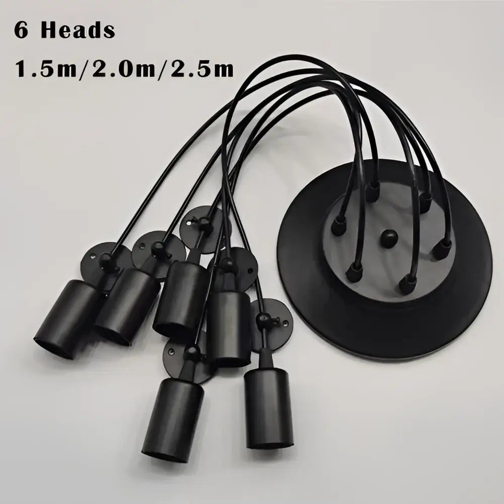 Industrial black finish pendant light with six black matte metal cylindrical light sources and adjustable cords for dining room