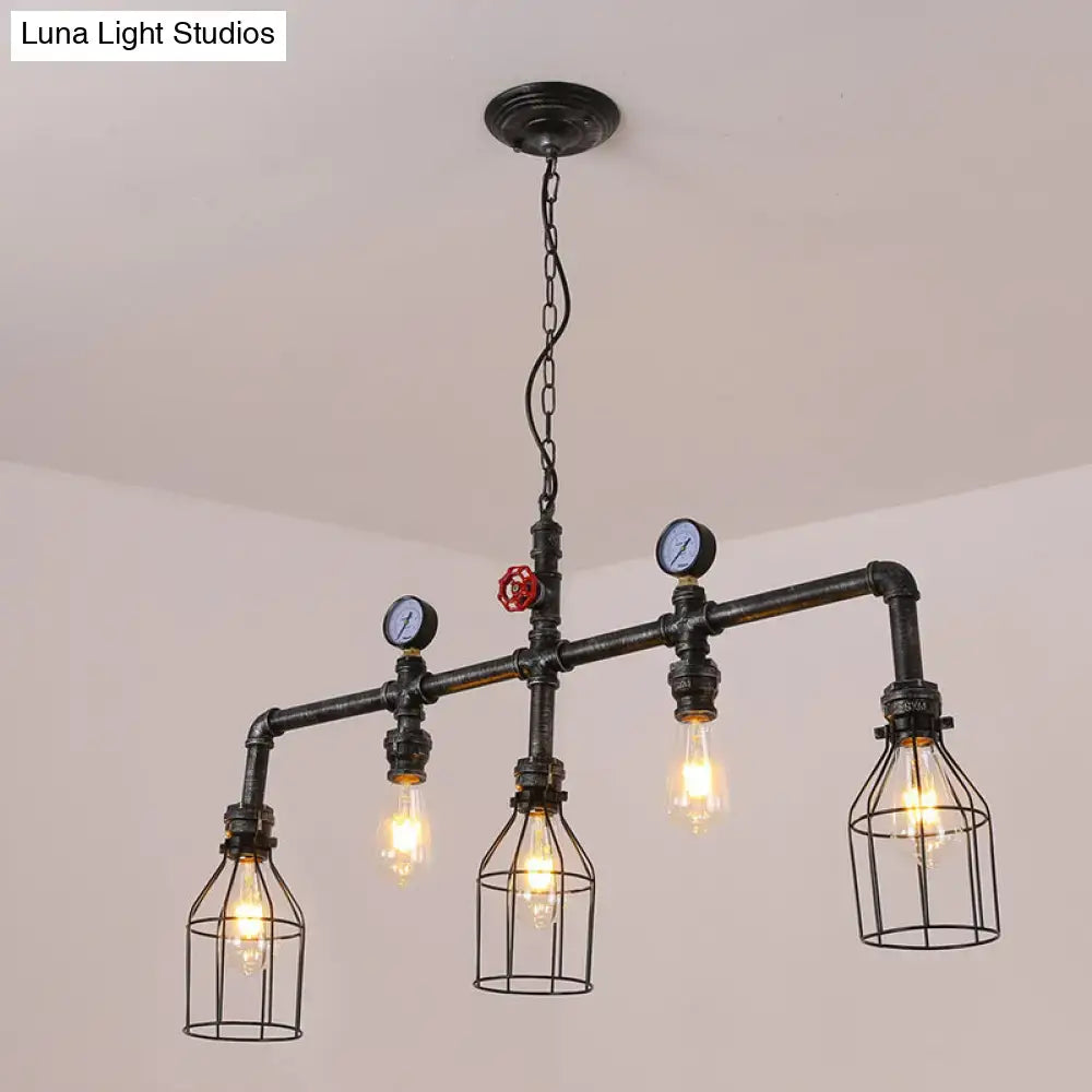 Industrial black gauge metal island lighting chandelier with four exposed filament bulbs, wire cages, blue gauges, and red valve