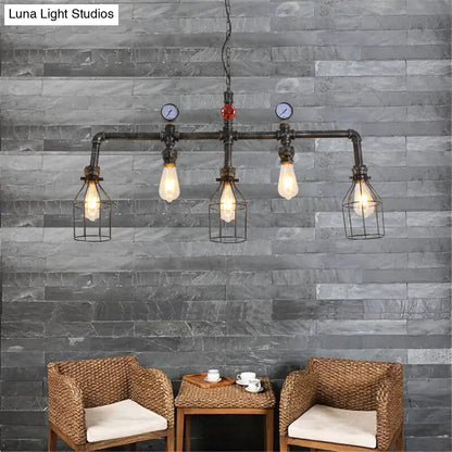 Industrial black gauge metal island lighting chandelier with four filament bulbs in wire cages and decorative gauges