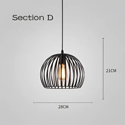 Black wrought iron industrial pendant light with geometric cage light frame and exposed filament bulb for dining room decorbites cage light