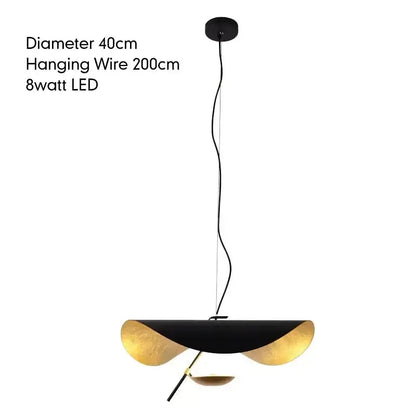 Modern black and gold lotus leaf pendant light with sleek curved design ideal for dining room decorbites lederam manta