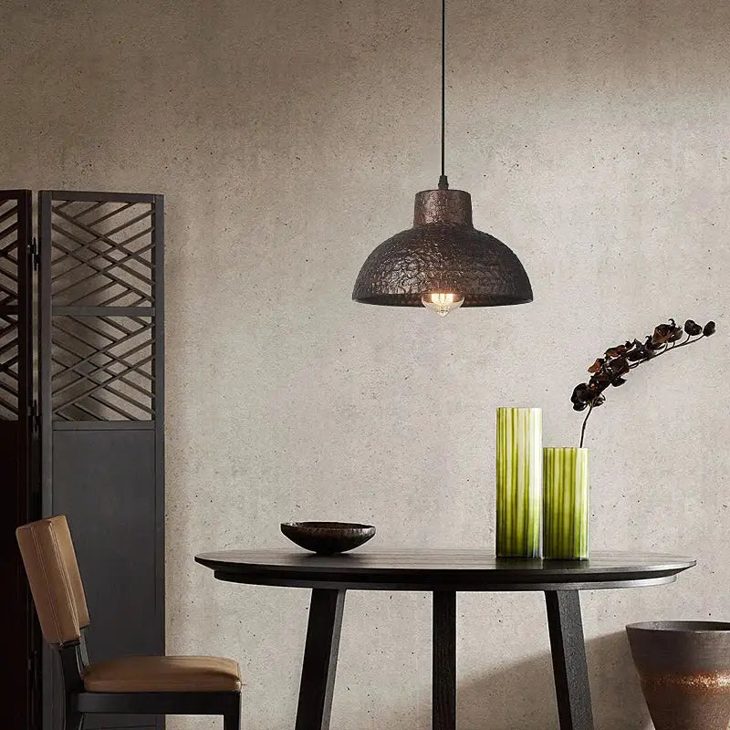 Industrial black hammered metal pendant lamp with dark textured finish for kitchen dining room decorbites industry style