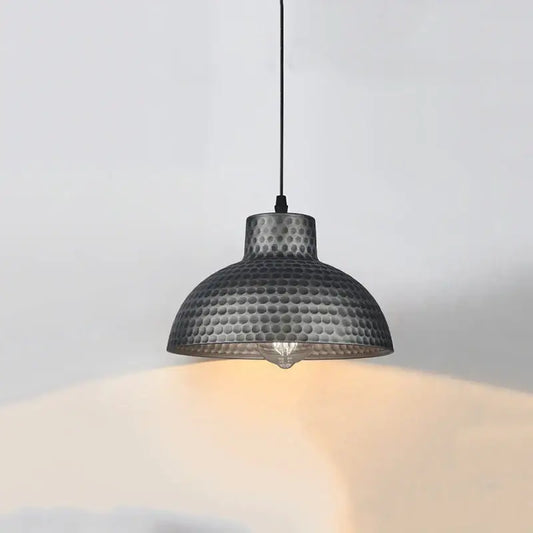 Industrial black hammered metal pendant lamp with warm glow ideal for kitchen dining room decorbites industry style decor