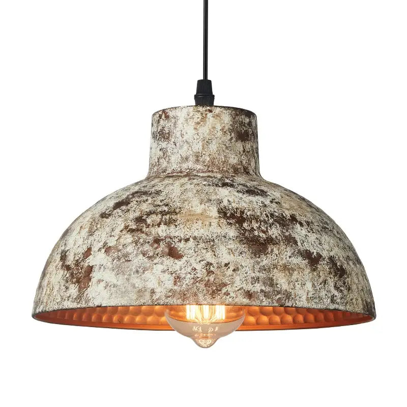 Industrial black hammered metal pendant lamp with distressed finish and warm copper interior for kitchen decorbites industry style lighting