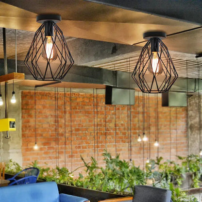 Black geometric cage pendant lights with exposed filament bulbs from decorbites iron aisle ceiling lamp collection