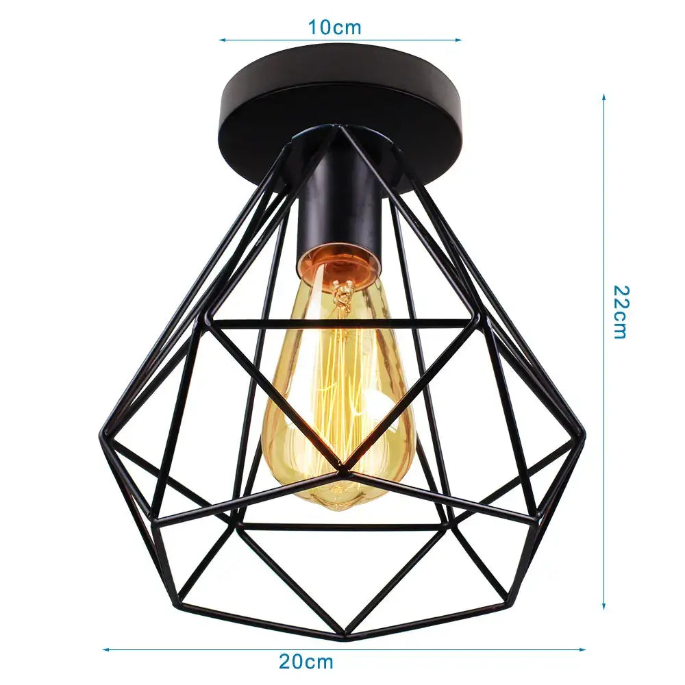 Industrial black iron aisle ceiling lamp with geometric metal cage and warm amber filament bulb by decorbites iron aisle