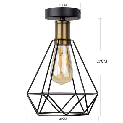 Industrial black iron cage led ceiling light with brass stem and exposed edison bulb for dining room decorbites iron cage