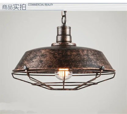 Industrial black iron pendant lights with distressed bronze finish feature a domed wire cage shade for dining room decorbites iron pendant