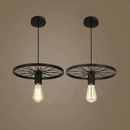 Industrial black iron wheel chandelier pendant light featuring black metal bicycle wheel design with exposed filament bulbs