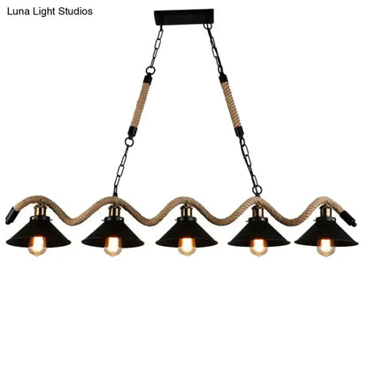 Black industrial led chandelier with five conical shades suspended by beige hemp rope and black metal chains