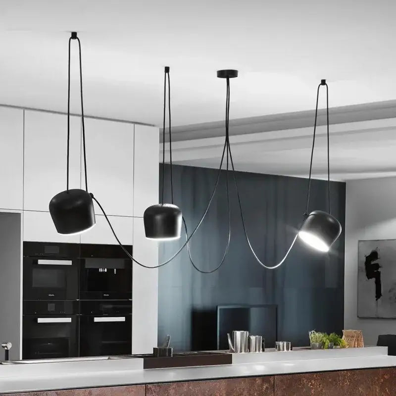 Black matte spider pendant lamp with sleek curved cords and adjustable shades for dining room decorbites industrial spider