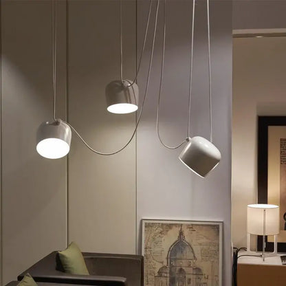 Modern white decorbites industrial spider pendant lamp with sleek curved metal cords and cylindrical shades for dining rooms
