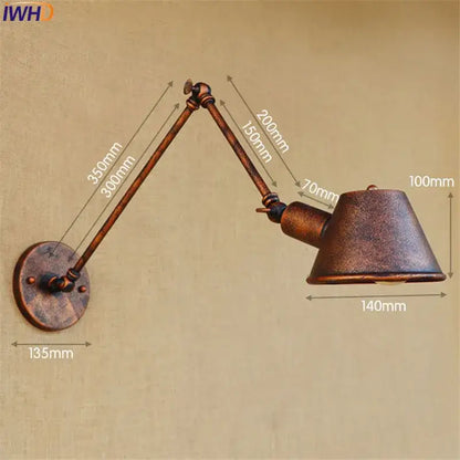 Antique bronze-finished adjustable wall sconce with articulated arms and conical shade for decorbites golden vintage lighting