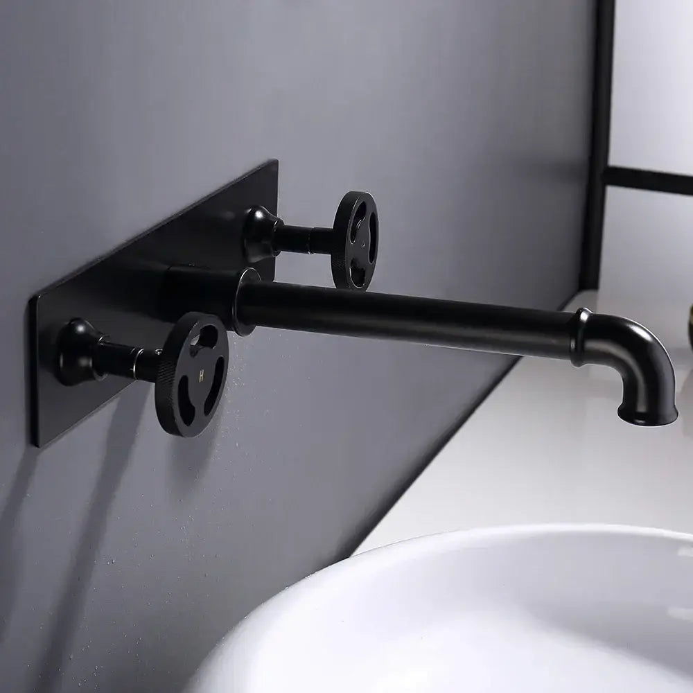 Industrial black matte wall mounted basin faucet with exposed pipe and dual handwheel controls for bathroom decorbites black wall
