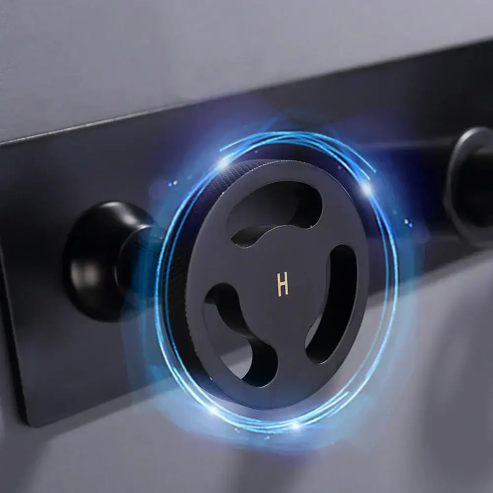 Industrial black matte wall mounted basin faucet with black circular showerhead and glowing blue light decorbites black wall mounted
