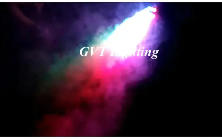 A vibrant multi-colored spotlight beam cutting through dark smoke from an industrial black metal 500w wireless fog machine