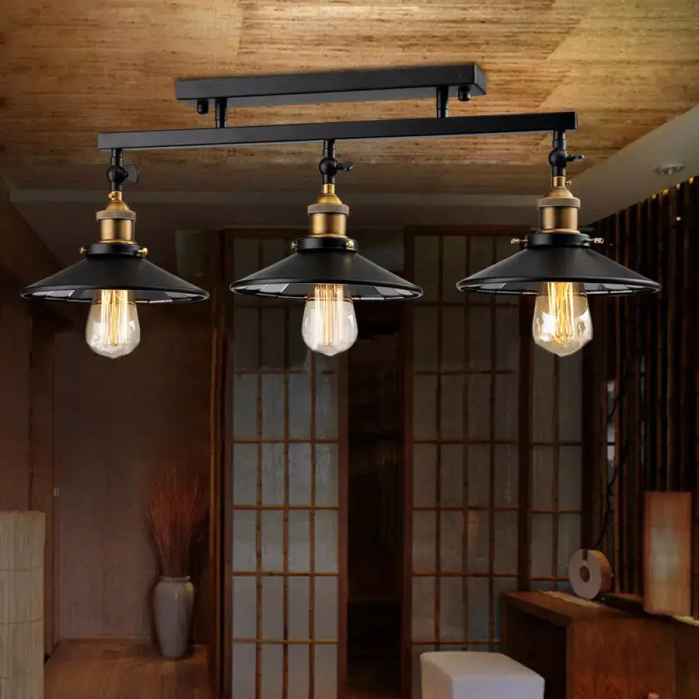 DecorBites black metal vintage ceiling light fixture with three exposed filament bulbs and brass cone shades