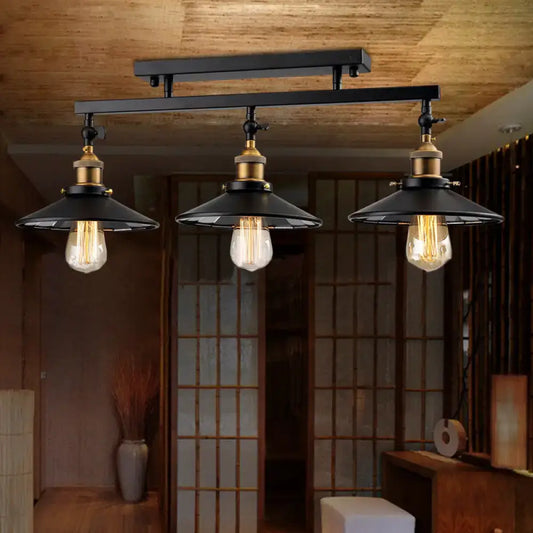 DecorBites black metal vintage ceiling light fixture with three exposed filament bulbs and brass cone shades