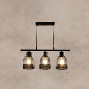 Decorbites industrial metal bar chandelier featuring black birdcage pendant lights with exposed filament bulbs