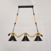Decorbites™ industrial metal conical island ceiling light with black conical shades, brass fixtures, and wavy hemp rope accents