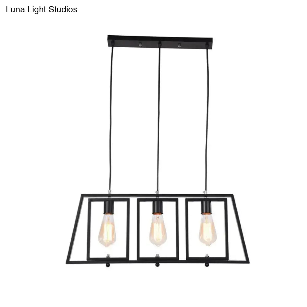 Black metal hanging pendant light with trapezoid frame and three exposed edison bulbs for kitchen island lighting