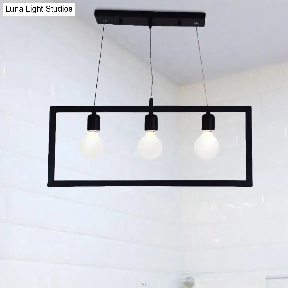 Black rectangular pendant light fixture with three exposed bulb sockets and black metal frame for ceiling hanging