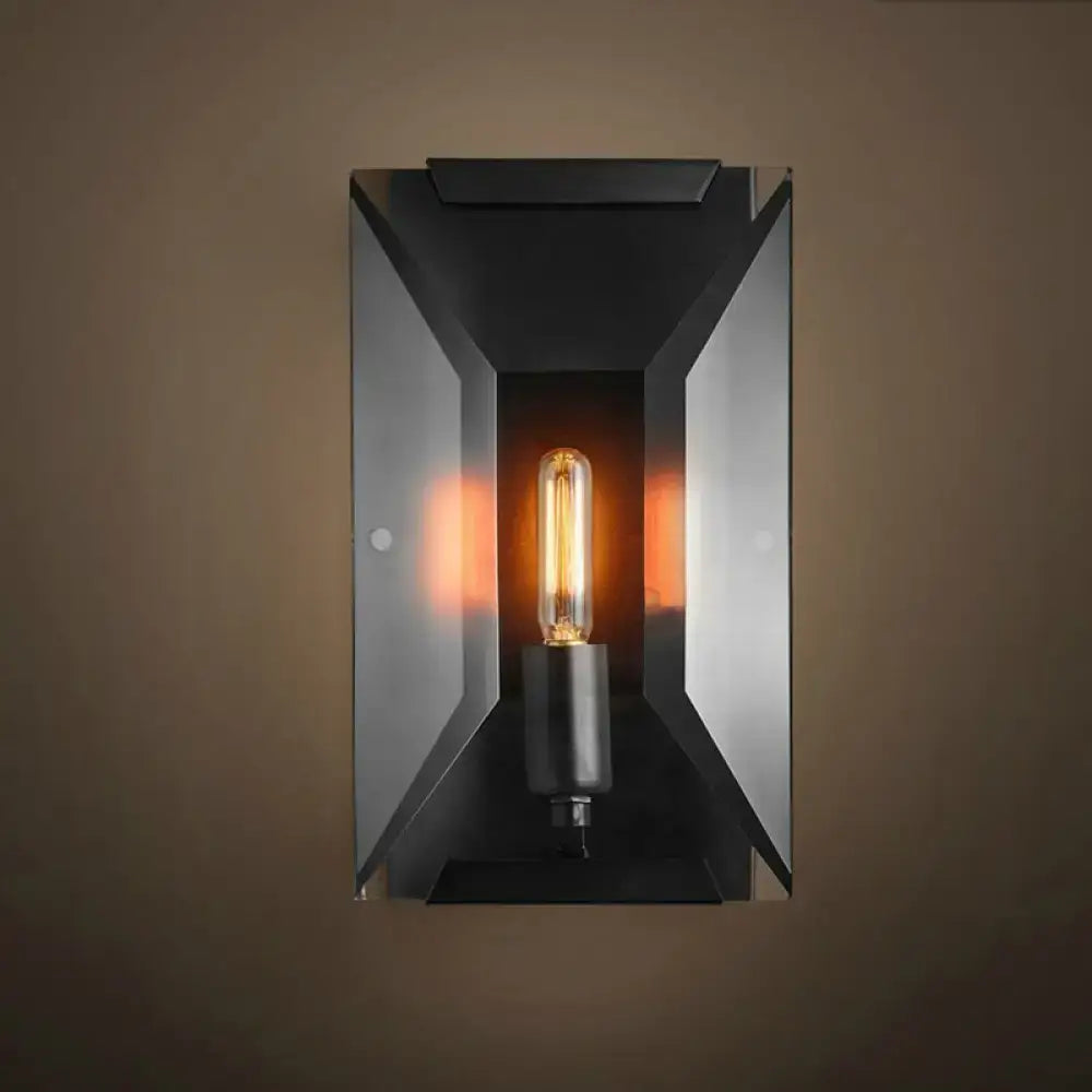 Industrial black metal wall mounted sconce light with a glowing Edison bulb for bedroom wall mounted lamp fixture