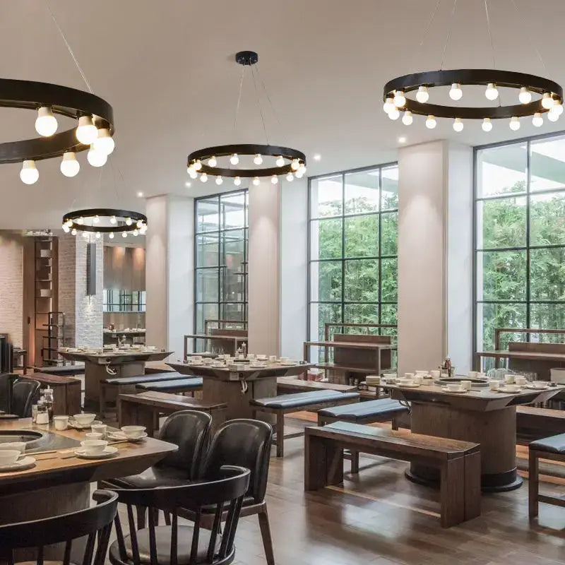 Industrial black multi tier pendant light with exposed bulbs hanging from ceiling for decorbites industrial duplex staircase