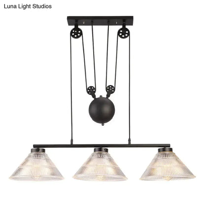 Black industrial cone pendant light with prismatic glass shades and adjustable pulley island lamp by decorbites
