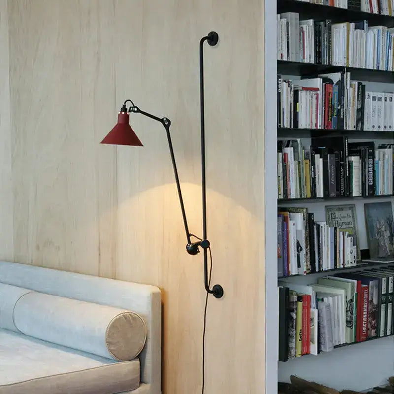 Industrial black and red swing arm wall lamp with red conical shade and black articulated arm decorbites industrial iron wall lamp