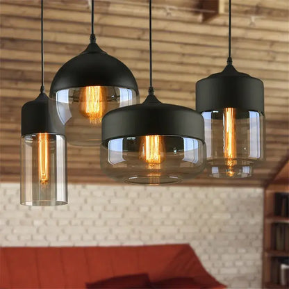 Industrial black and smoked glass shade pendant light with exposed filament bulbs for kitchen decor
