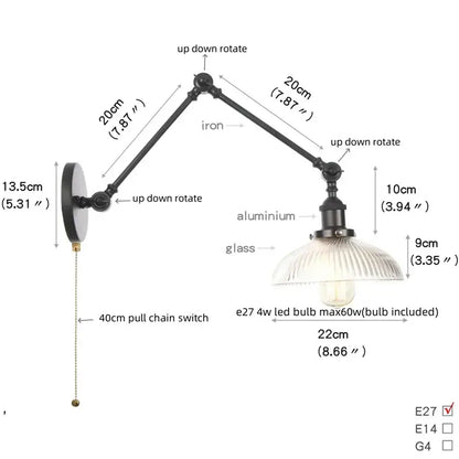 Industrial black swing arm wall light fixture with adjustable iron and aluminum arms and ribbed faceted glass shade