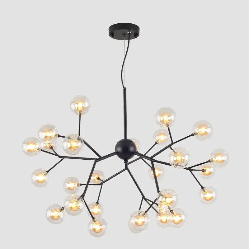 Industrial black tree branch chandelier featuring multiple clear decorbites glass ball firefly bulbs for dining room decor