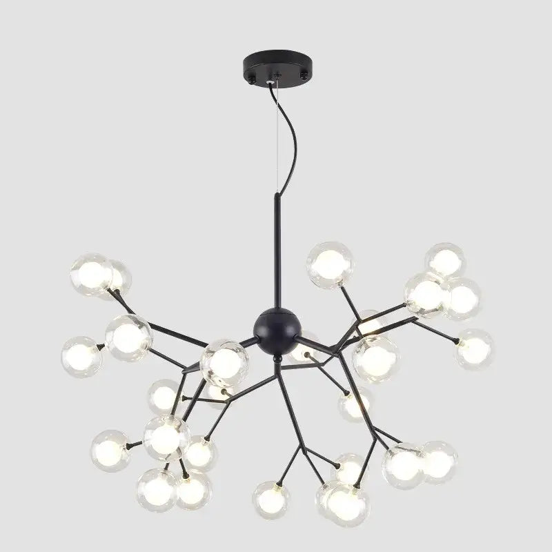 Industrial black tree branch chandelier with multiple clear glass ball firefly bulbs for dining room decorbites decor