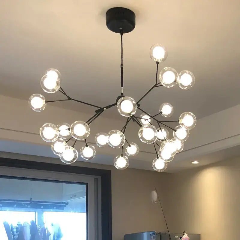 Modern black metal tree branch chandelier with clear decorbites glass ball firefly bulbs for dining room decor