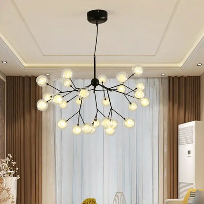 Industrial black tree branch chandelier with multiple clear glass ball firefly bulbs for dining room decorbites decor
