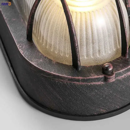 Industrial black wall lamp with rustic metal frame and ribbed frosted glass shade for stairway lighting decorbites industrial glass wall