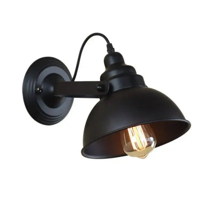 Industrial black wall sconce with matte wrought iron finish and exposed Edison bulb for retro bedroom decorbites industrial black