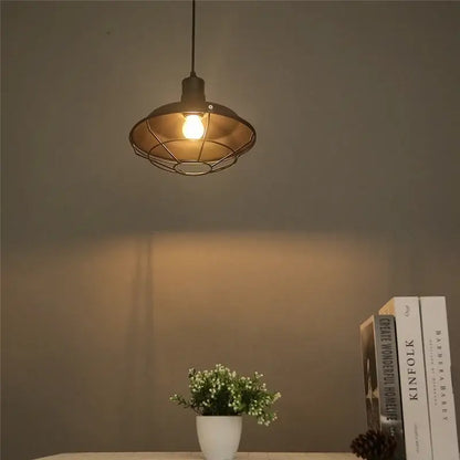 Industrial black and white iron pendant lights with metal cage design and warm glow for kitchen decorbites iron pendant