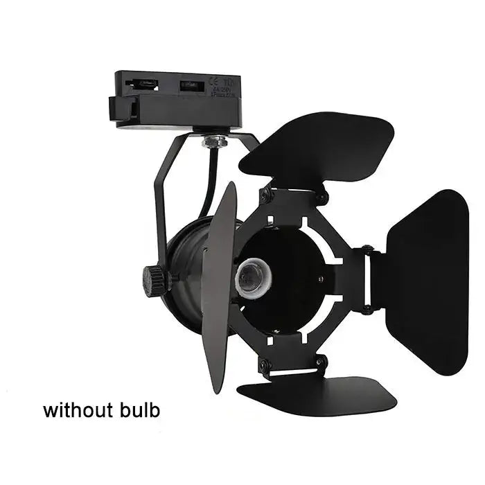 Industrial black and white track spotlight with adjustable barn doors and mounting bracket for office use