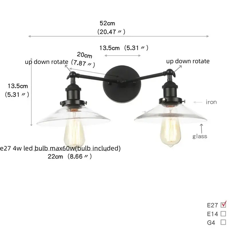 Black iron wall light with two adjustable arms and clear glass shades featuring edison-style bulbs decorbites industrial led
