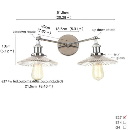 Industrial led wall light with polished chrome iron arms and clear glass shades featuring vintage edison bulbs
