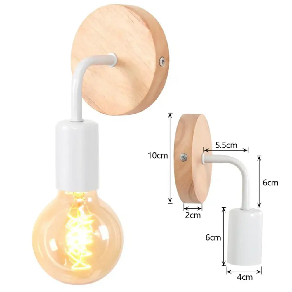 Minimalist industrial led wall light with natural wood backplate white metal arm and exposed edison bulb for bedroom decorbites