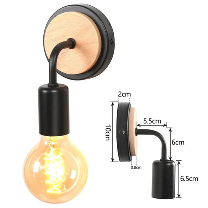 Black metal and wood wall light with curved arm and exposed filament bulb for industrial led wall decorbites bedroom use