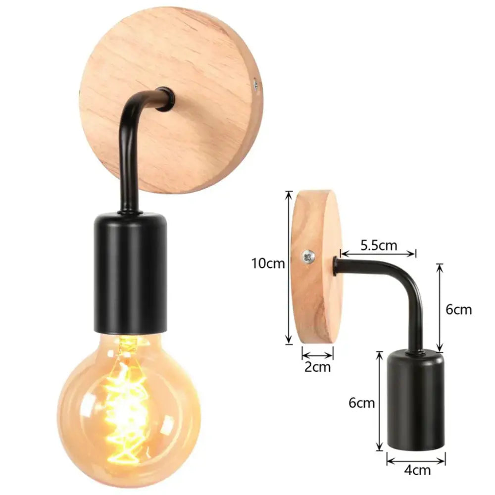Industrial black and white wall light set with wooden circular backplate and black metal arm featuring exposed filament bulb decorbites industrial led wall light