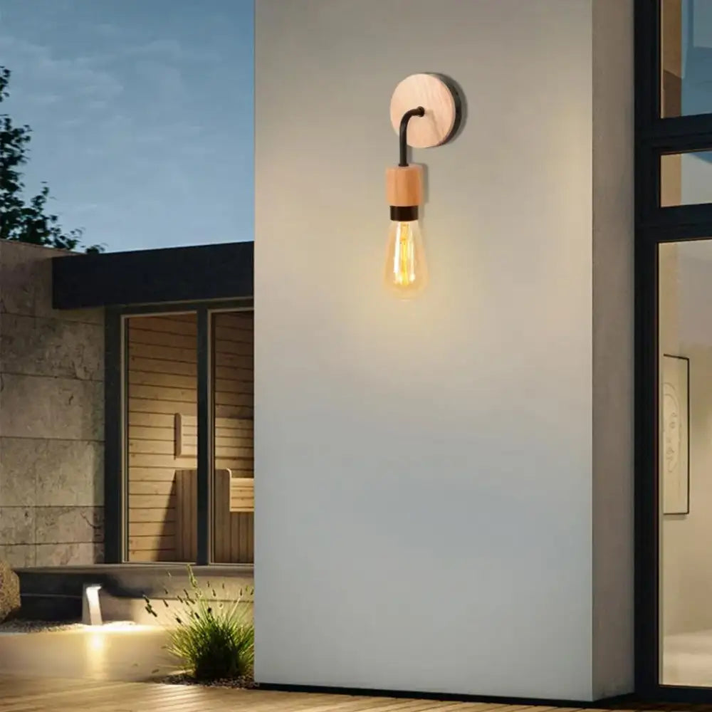 Industrial black and white wall light set with warm-toned wooden backplate and black metal arm decorbites industrial led wall light