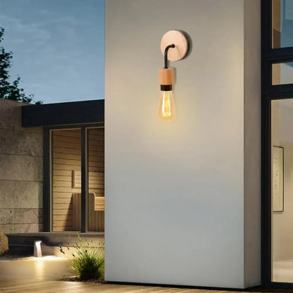 Industrial black and white wall light set with warm-toned wooden backplate and black metal arm decorbites industrial led wall light