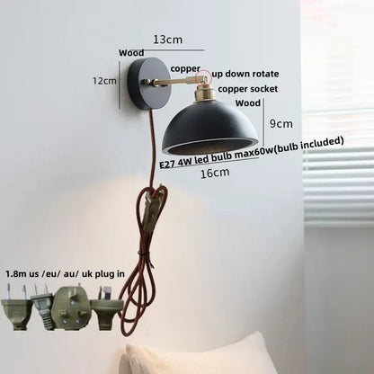Industrial black wood led wall sconce with black dome shape wooden base and copper accents for stair lighting decorbites black wood